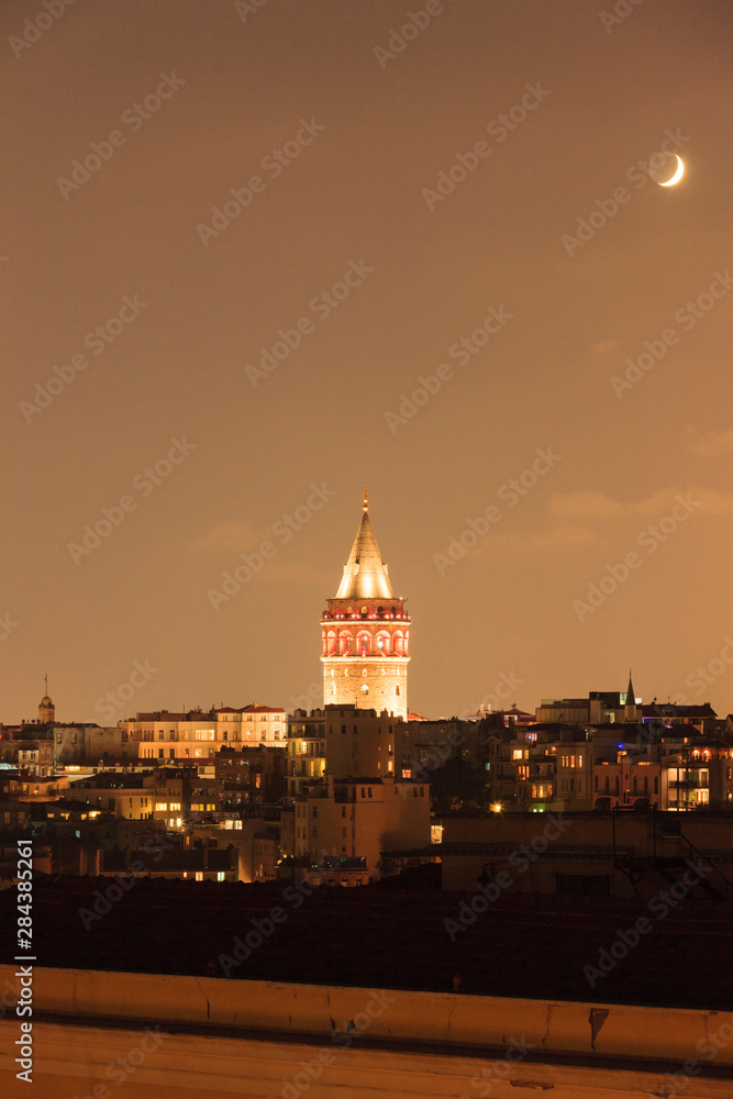 Galata Tower under the Moon. Istanbul. Turkey.