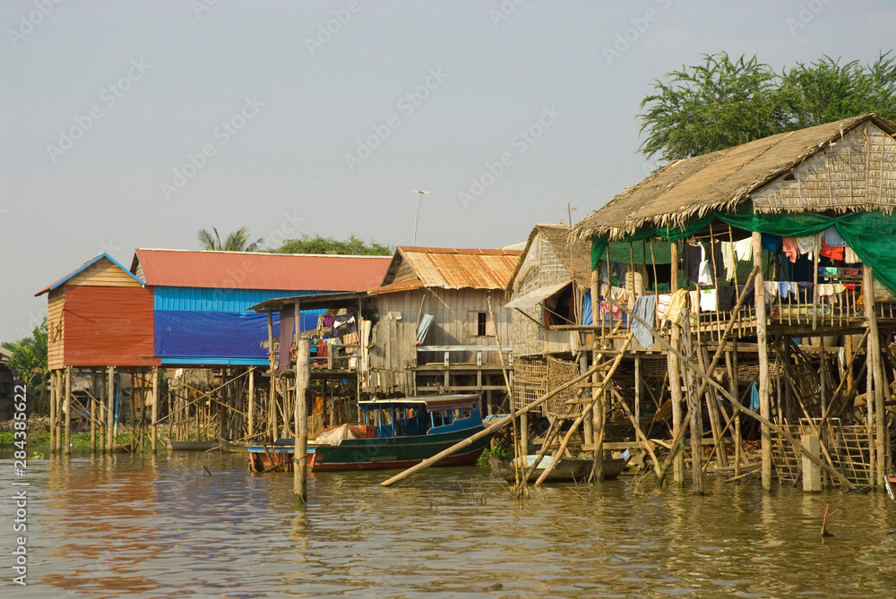 Cambodia. Tonle Sap Lake. Houses on stilts line the shore of Tonle Sap Lake.
