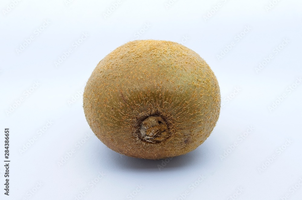 Fototapeta premium Whole kiwi fruit isolated on white background