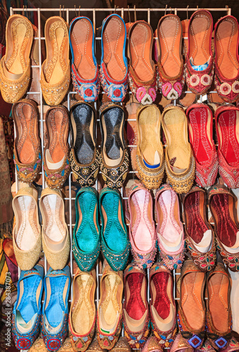 Dubai, UAE. Shoes for sale in the old market (souks) across Dubai Creek from the modern city center.