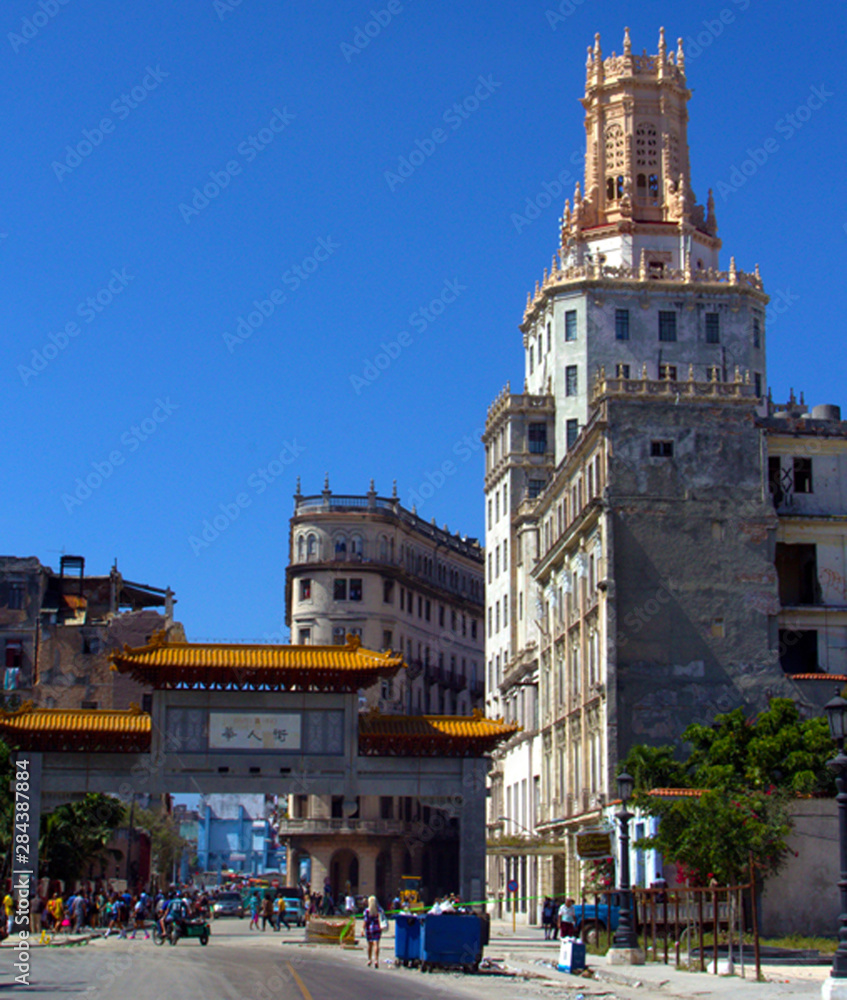 Fototapeta premium Havana, Cuba, Chinese arch entrance to Cuban China Town or Barrio Chino in center of Havana with people in the distance