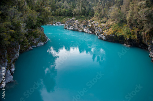 South Pacific, New Zealand, South Island. The glacial, flour-laden Hokitika River. 