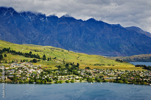 New Zealand, South Island, Queenstown. Landscape of city, mountains, and Lake Wakatipi. 