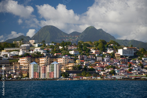 MARTINIQUE. French Antilles. West Indies. City of Fort-de-France below cumulus clouds. © Scott T. Smith/Danita Delimont