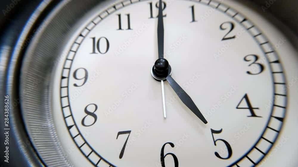 The Clock With Black Arrows Shows The Time Five Hours Timelapse. The Clock With Black Arrows Shows The Time Five Hours Timelapse.