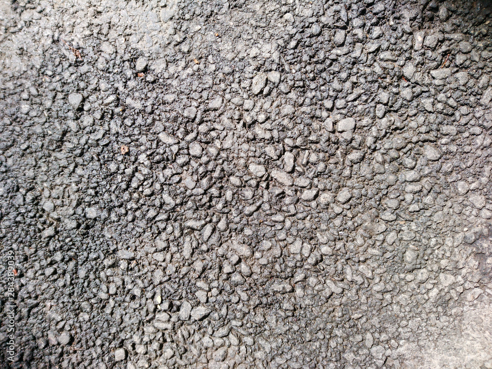 Road surface texture close up asphalt elements grey path material background Road surface texture close up asphalt elements grey path material background