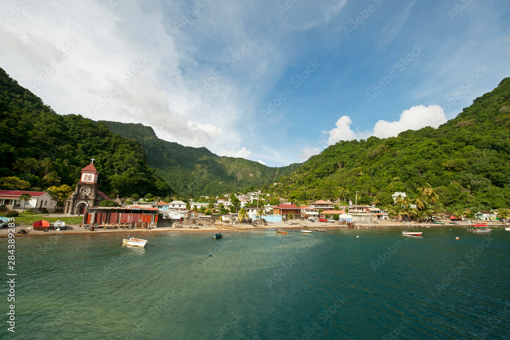 Dominica, Roseau, view of colorful villages south of Roseau on the green hills