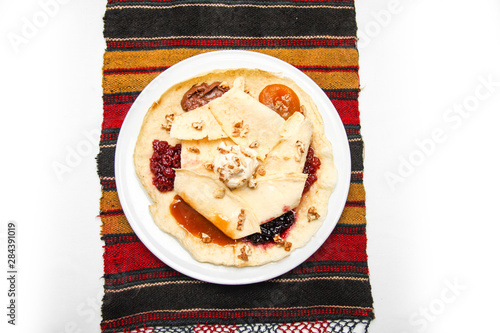 traditional pancakes with 6 different  jams