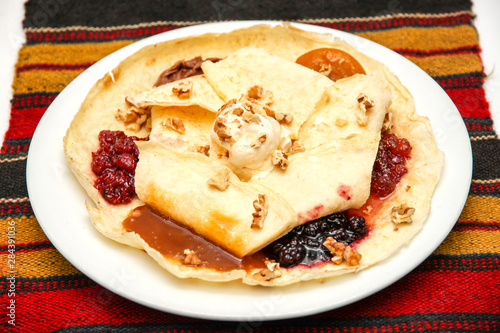 traditional pancakes with 6 different  jams