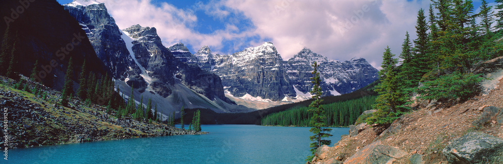 Canada, Alberta, Moraine Lake. Clouds hide the peaks of Moraine Lake in the Valley of the Ten Peaks in Banff NP, a World Heritage Site, Alberta, Canada.