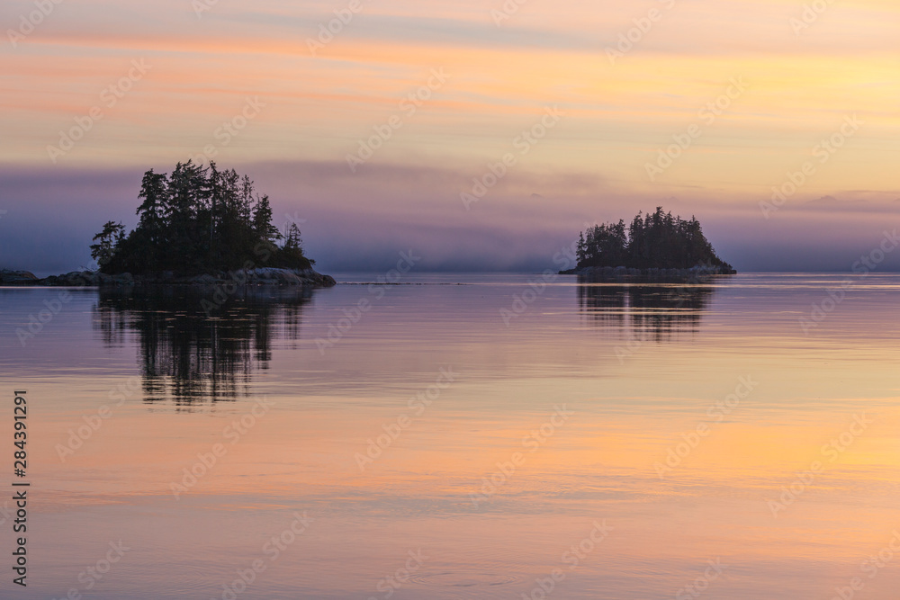 British Columbia. Sunset paints a canvas of pastel hues in Johnstone Strait.