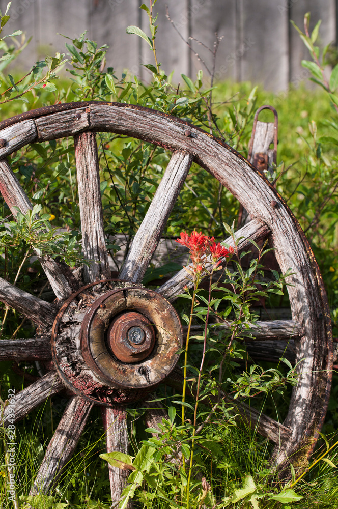 Old wagon wheel in historic old gold town Barkersville, British Columbia, Canada. Old wagon wheel in historic old gold town Barkersville, British Columbia, Canada.