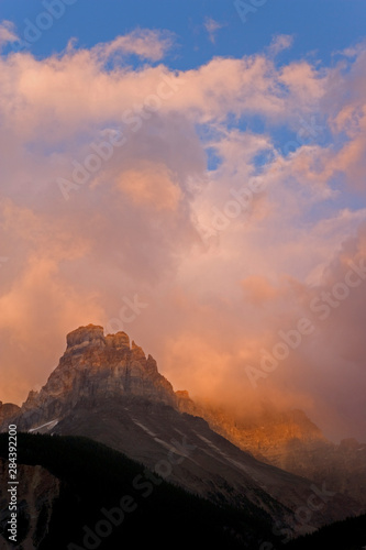 Canada, British Columbia, Yoho National Park. Sunset colors clouds over Cathedral Mountain. 
