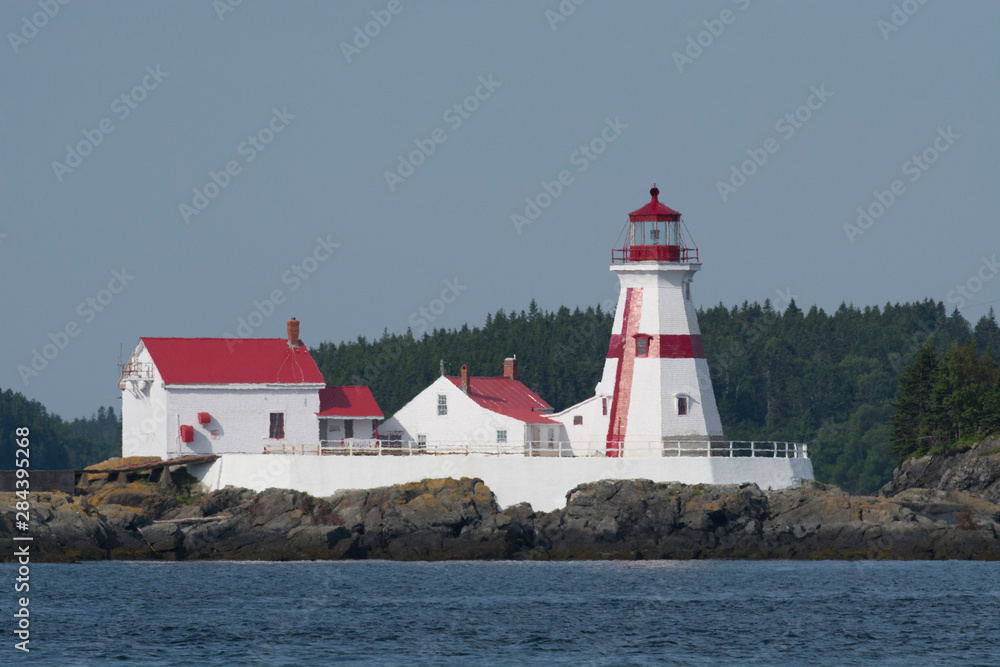 Canada, New Brunswick, Bay of Fundy, Campobello. Campobello Island, historic East Quoddy Lighthouse (aka Head Harbour Light), circa 1829. Canada, New Brunswick, Bay of Fundy, Campobello. Campobello Island, historic East Quoddy Lighthouse (aka Head Harbour Light), circa 1829.