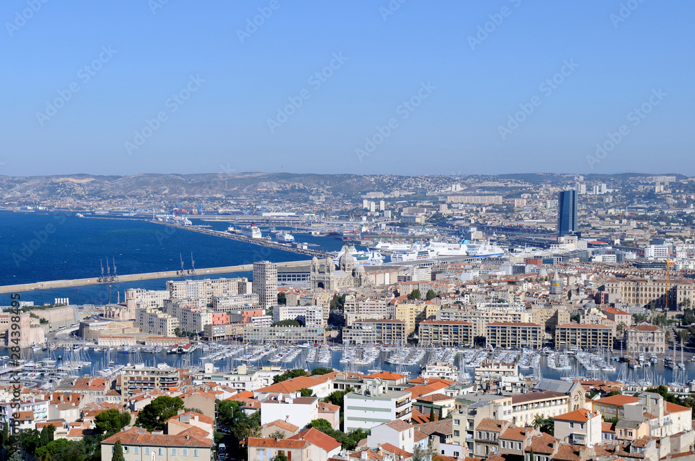 France, Provence-Alpes-Cote d'Azur, Bouches-du-Rhone, Marseille. The view of Marseille and the old harbor from the Basilique Notre Dame de la Garde