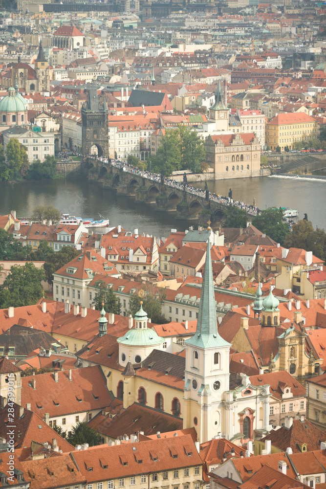 CZECH REPUBLIC, Prague. View of Prague and the Charles Bridge from the Bell Tower, St. Vitus Cathedral. 