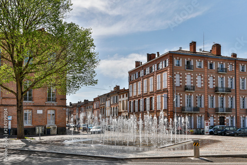 France, Montauban. Fountain in a town square photo