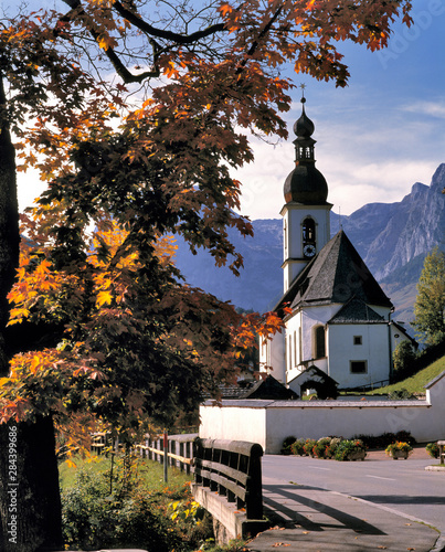 Germany, Bavaria, Ramsau. The quaint church known as Kunterwegkirche in Ramsau, Bavaria, Germany, sits along the road.