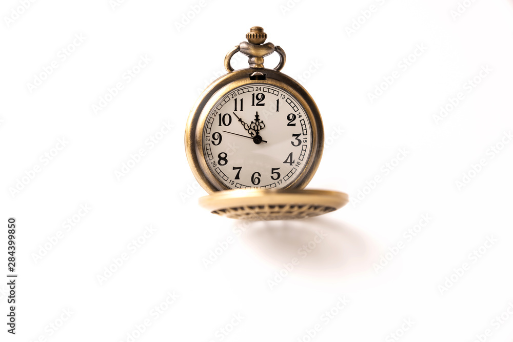 Old pocket watch closeup isolated on white background Old pocket watch closeup isolated on white background