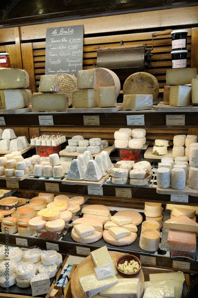 France, Paris. French cheeses at a market France, Paris. French cheeses at a market