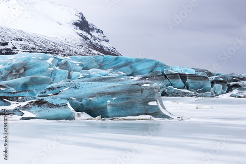 Iceland, Southwest Iceland, Skaftafell National Park, Skaftafelljokull Glacier. Huge chunks of ice are pushed into a frozen lagoon.