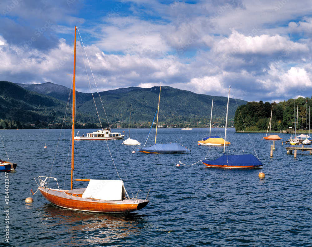 Fototapeta premium Germany, Bavaria, Tegernsee. Small ferries connect villages on the Tegernsee in Bavaria, Germany.