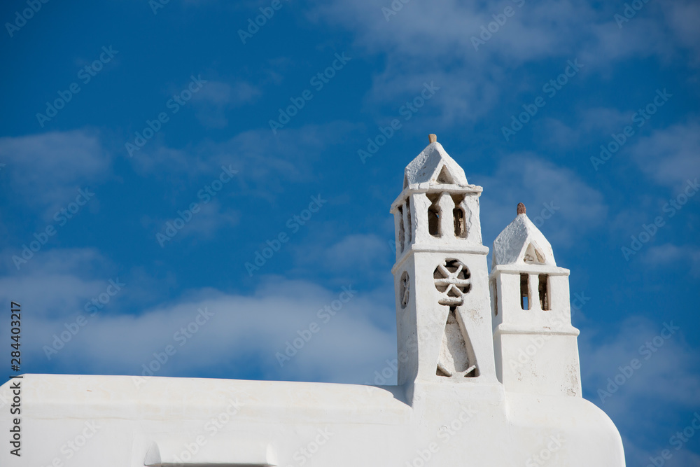 Greece, Cyclades, Mykonos, Hora. Typical whitewashed rooftop showing traditional Cycladic architecture..