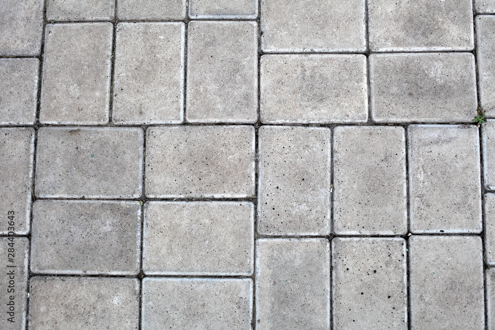 Fototapeta premium Paving gray tile background texture