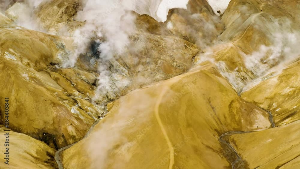 Aerial: Epic Steaming mountain Kerlingarfjoll Geothermal area in Highlands of Iceland Beautiful evening Cloudy Gloomy day Aerial: Epic Steaming mountain Kerlingarfjoll Geothermal area in Highlands of Iceland Beautiful evening Cloudy Gloomy day