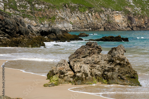 Ireland, County Mayo, Achill Island, Keem Strand. View of the coastline at the beach. photo