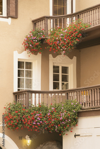 Italy, St Ulrich, Flowers on balcony © Adam Jones/Danita Delimont