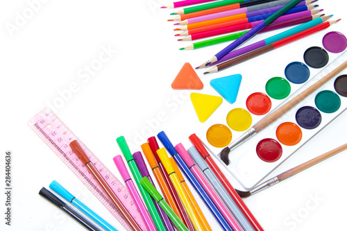 Back to school. Preparing for the school year. Stationery isolated on a white background. Bright stationery. Hello school. Stationery layout on a white background.