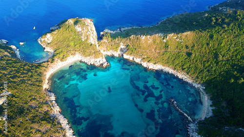 Fototapeta Naklejka Na Ścianę i Meble -  Aerial drone photo of iconic paradise bay of Porto Timoni with tropical deep blue and turquoise clear sea, Corfu island, Ionian, Greece