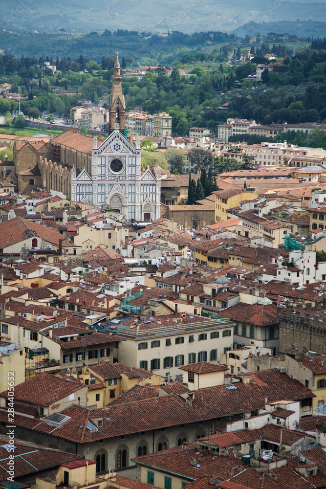 Italy, Florence. Aerial view of the Santa Croce Cathedral and surrounding city buildings. 