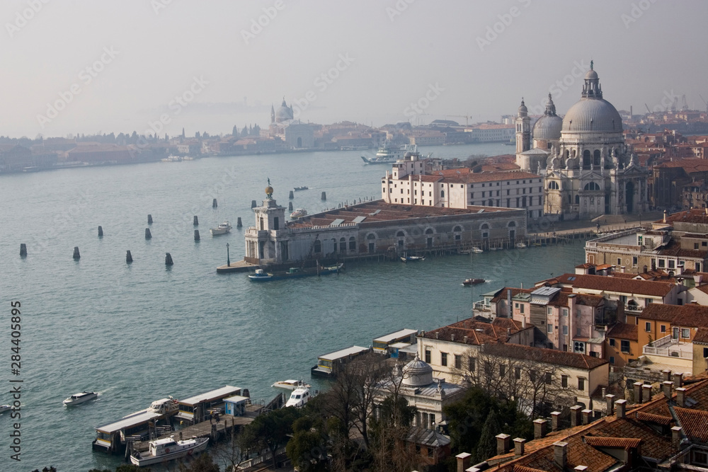 Italy, Venice. View of Basilica Santa Maria della Salute and Grand Canal from the Campanile.
