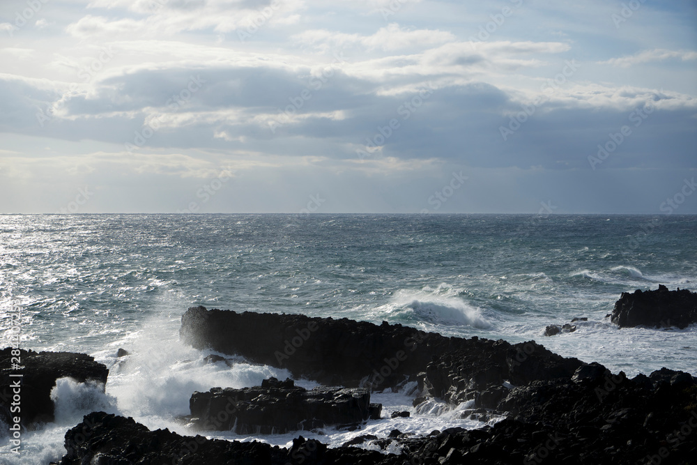 Italy, Sicily, the Ionian sea coast at Stazzo, Aci Reale, Catania. Black lava stones. Italy, Sicily, the Ionian sea coast at Stazzo, Aci Reale, Catania. Black lava stones.