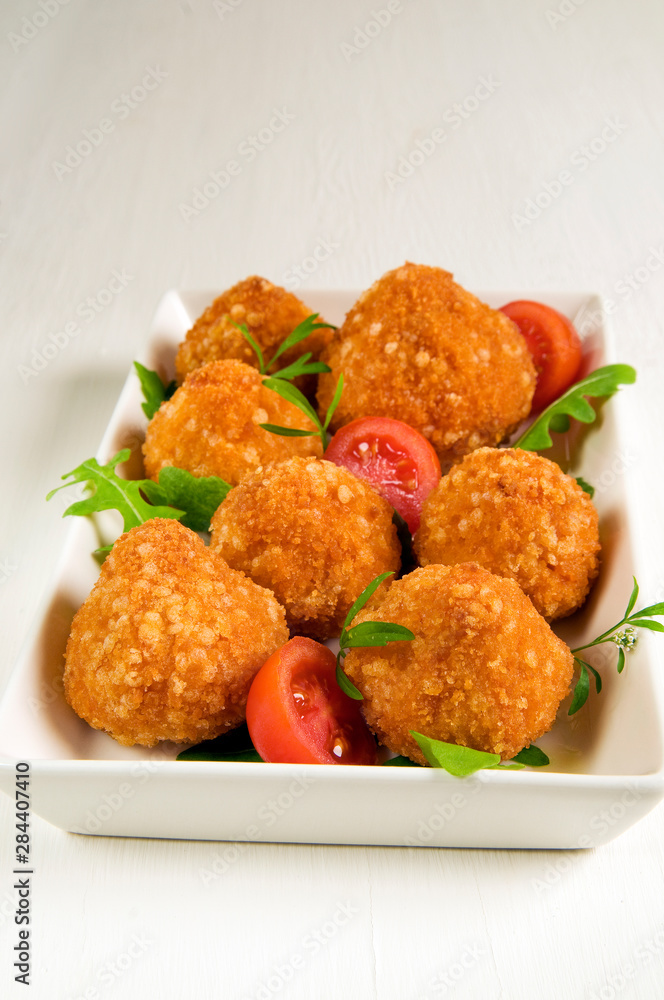 Arancini (deep-fried stuffed rice balls, Sicily) Arancini (deep-fried stuffed rice balls, Sicily)