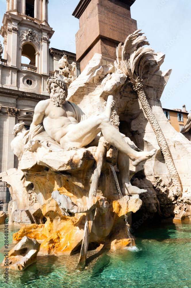 Fontana dei Quattro Fiumi, topped by the Obelisk of Domitian, River-god Ganges, St. Agnese in Agone, Piazza Navona, Rome, Unesco World Heritage Site, Latium, Italy, Europe