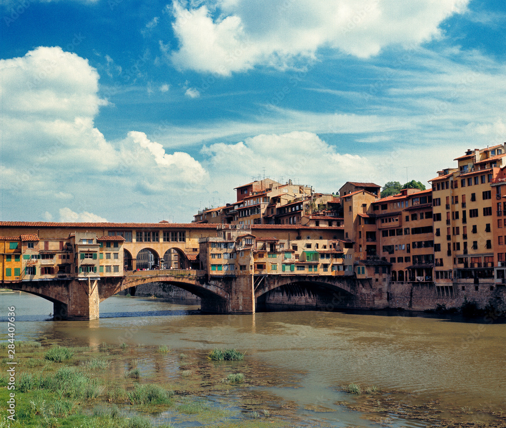 Italy, Florence. The Ponte Vecchio stretches across the Arno River in Florence, a World Heritage Site, Italy.