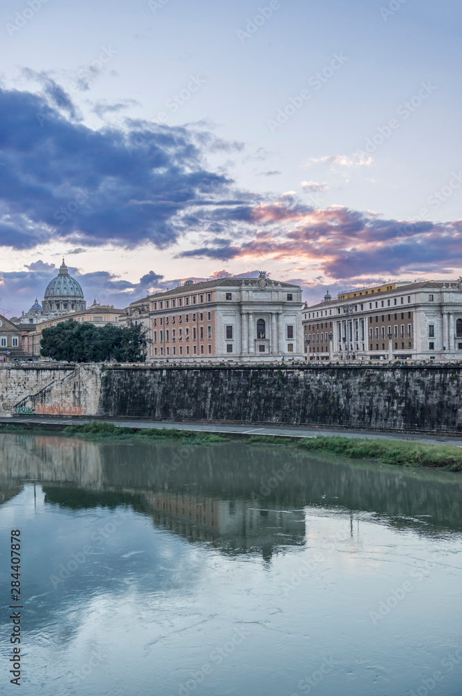 Italy, Rome, Tiber River with St. Peter's Basilica in the Background