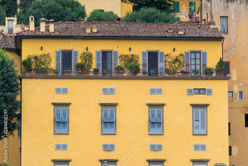 Italy, Florence. View over Arno River to Oltrano area. Balcony garden lovely photo