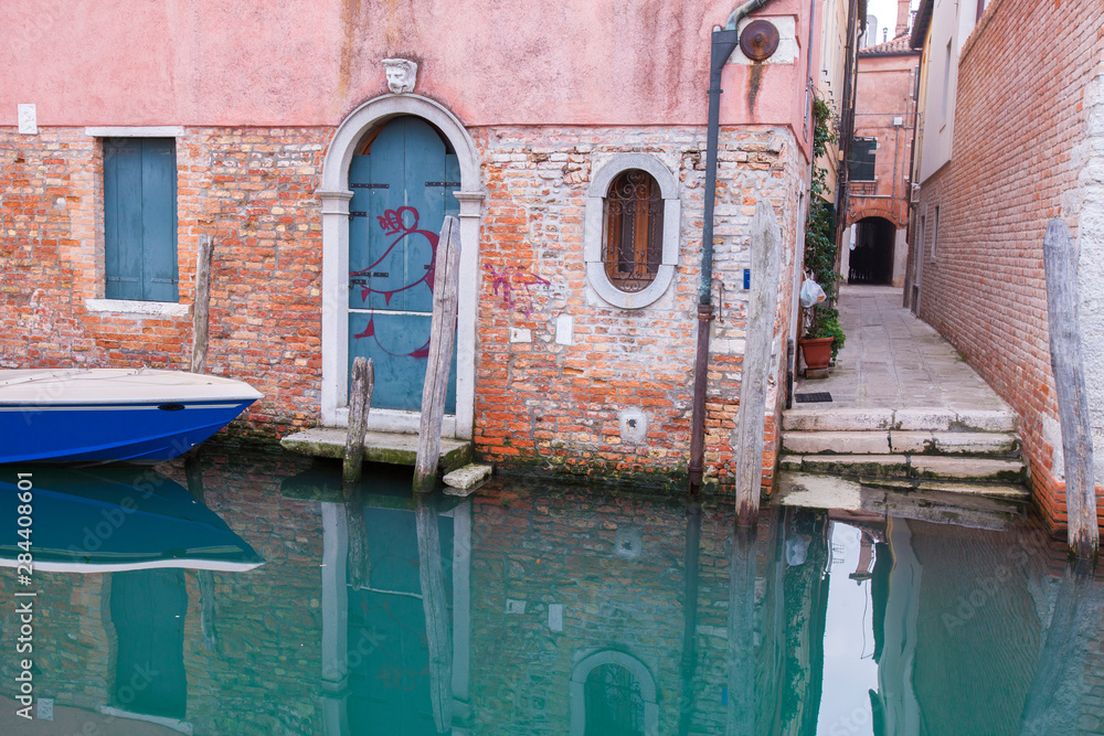 Home Entrance from Canal side. Venice. Italy.
