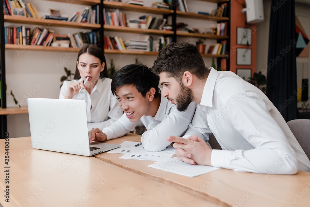 office workers doing business project together office workers doing business project together