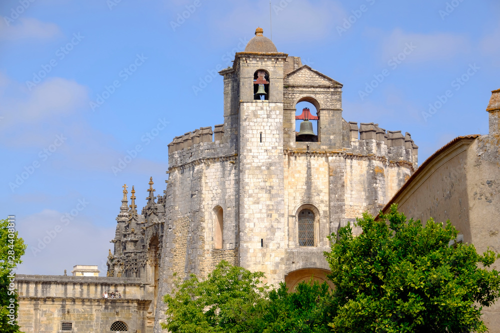 Portugal, Tomar. Tomar Castle, Knights of the Templar fortress, castle and convent. Convent of Knights of Christ. Romanesque architecture. Bell towers. Charola, Rotunda. Exterior and gardens.