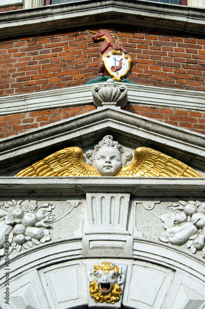 Obraz premium Netherlands (aka Holland), West Friesland, Hoorn. Historic facade with city crest & gold winged angel.