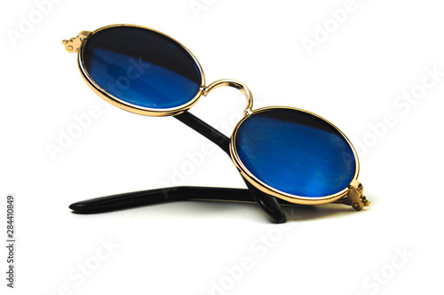 round sunglasses with blue glass isolated on white background