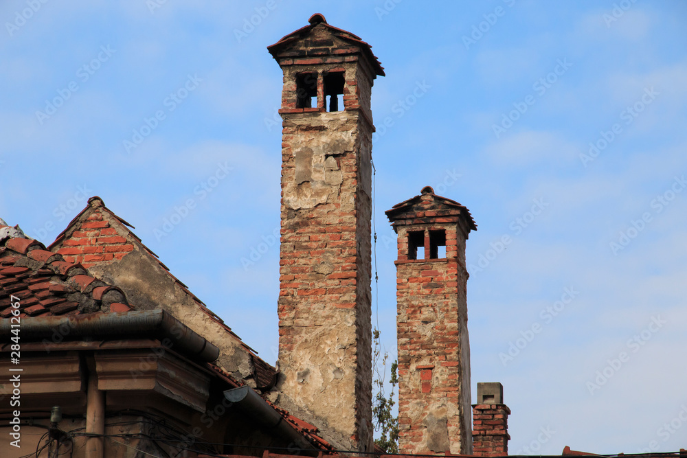 Romania, Brasov, Old town, Tall brick chimneys.