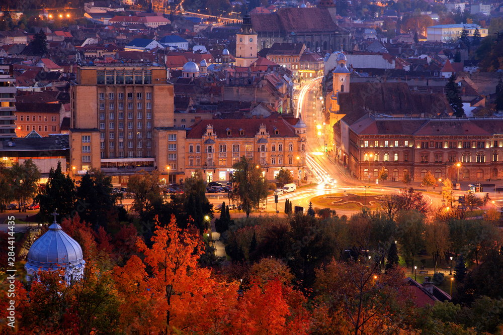 Romania, Transylvania, Brasov, city view. Changing colors of Autumn. Buna Vestire Romanian Orthodox Church dome.