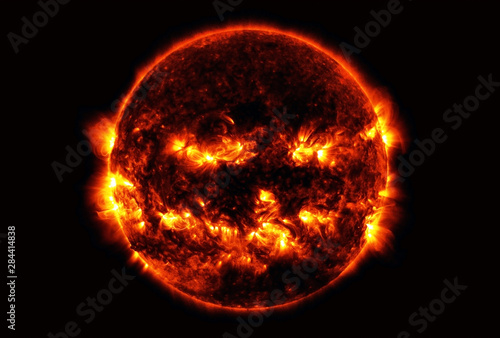 The sun, with vortices and winds, on a dark background. Elements of this image were furnished by NASA