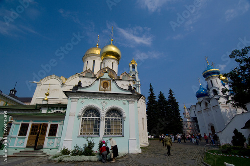 Russia, Golden Ring (aka Zolotoe Koltso), Sergiyev Posad (aka Sergiev), formerly Zagorsk. Trinity Monastery of St. Sergius. Cathedral of the Holy Trinity (1422) & church of St. Nicon (1548)  photo